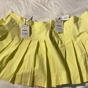 Two yellow skirts brand new from Zara.